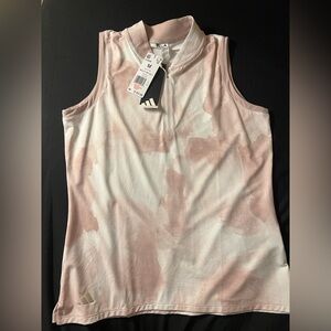 ADIDAS TENNIS TOUR SLEEVELESS POLO SHIRT
White/Pink
$80.00 MSRP